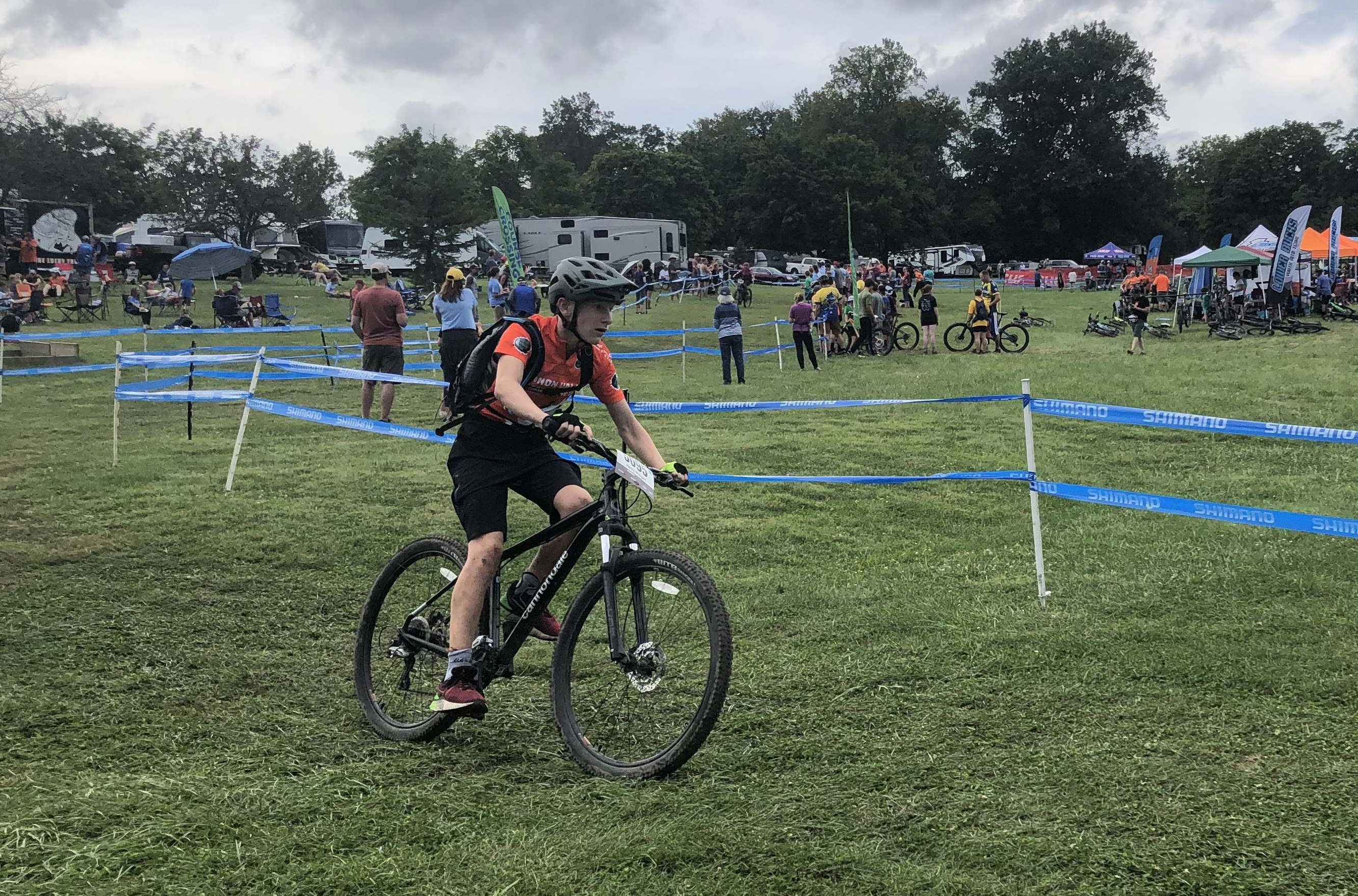 Rider racing on mountain bike trail